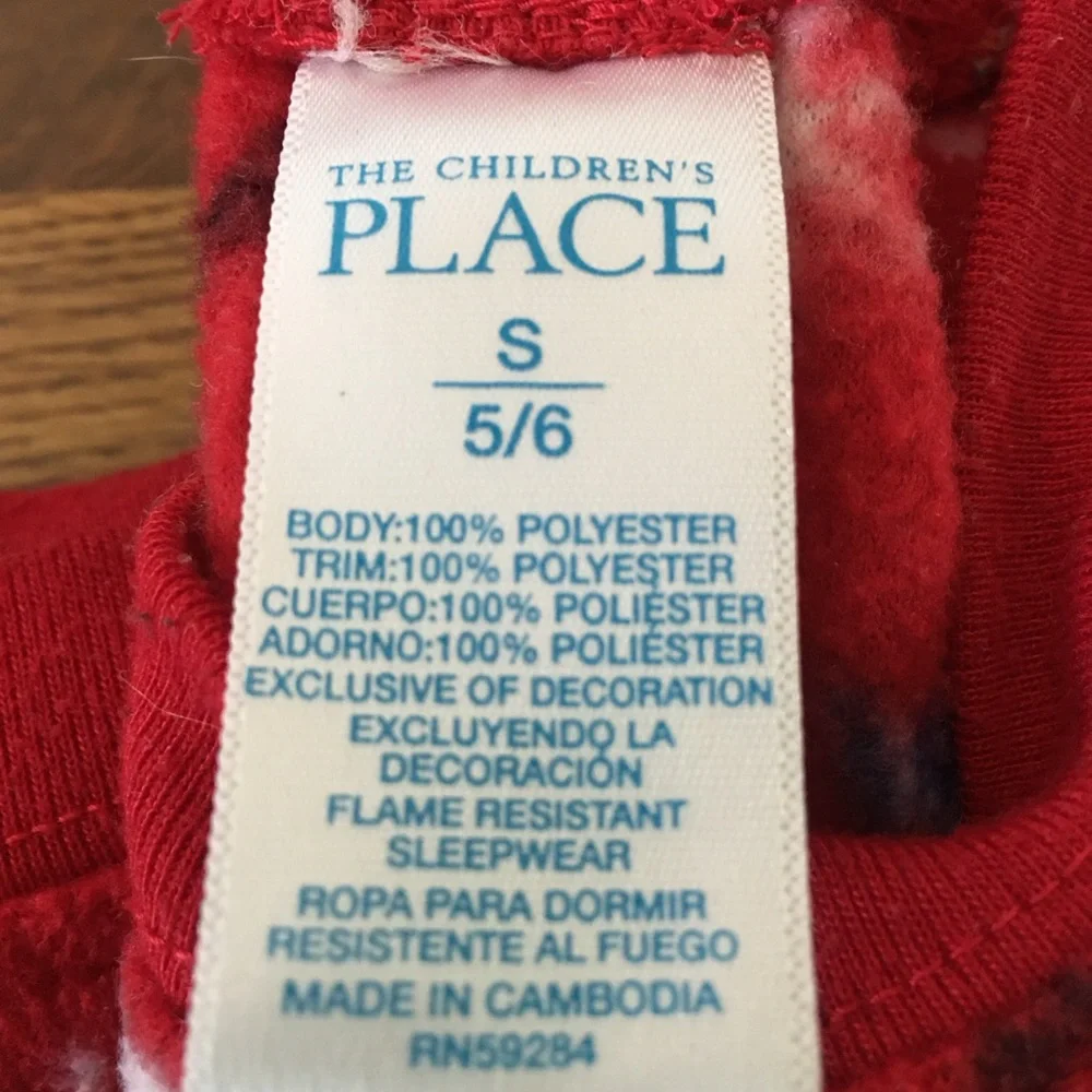 Kids size small red winter pajama set with snowmen